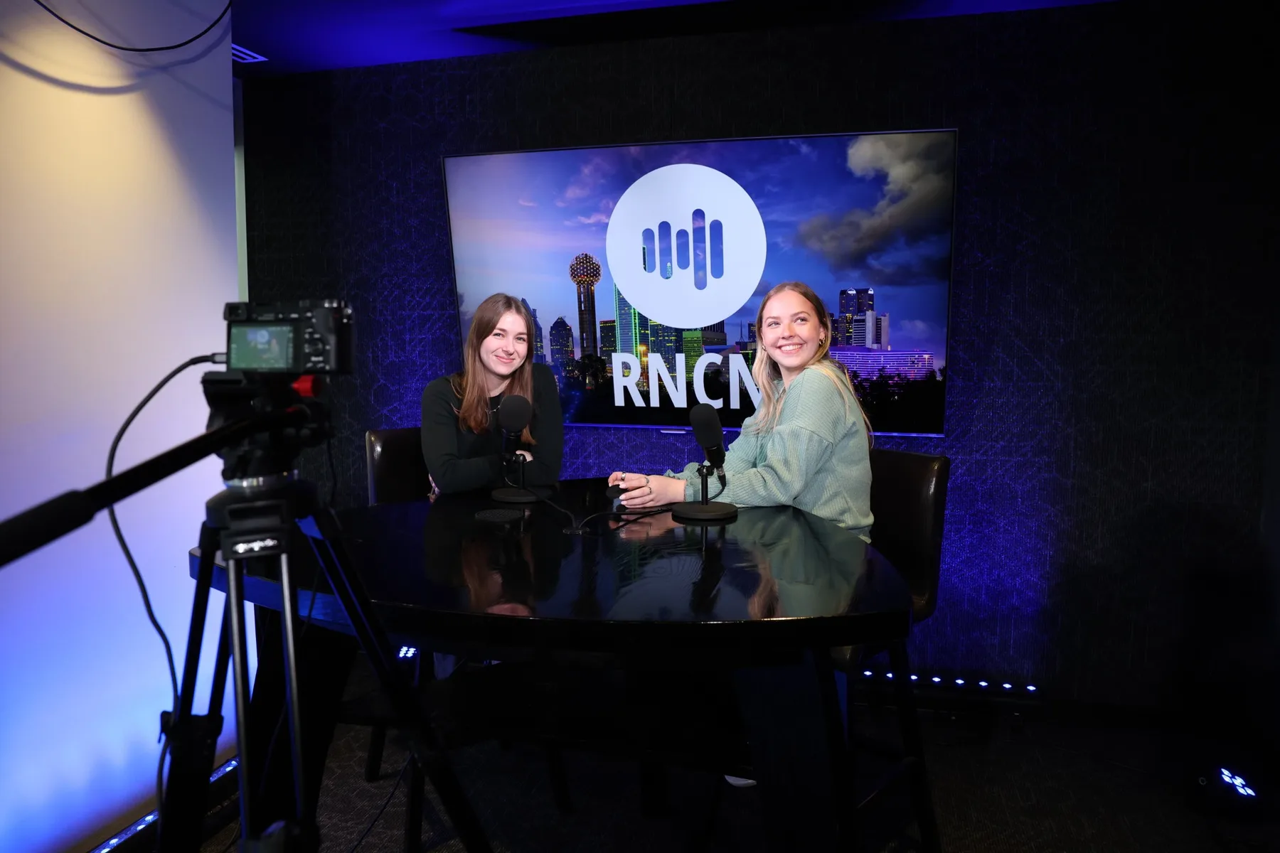 Two guests recording together in an RNCN studio